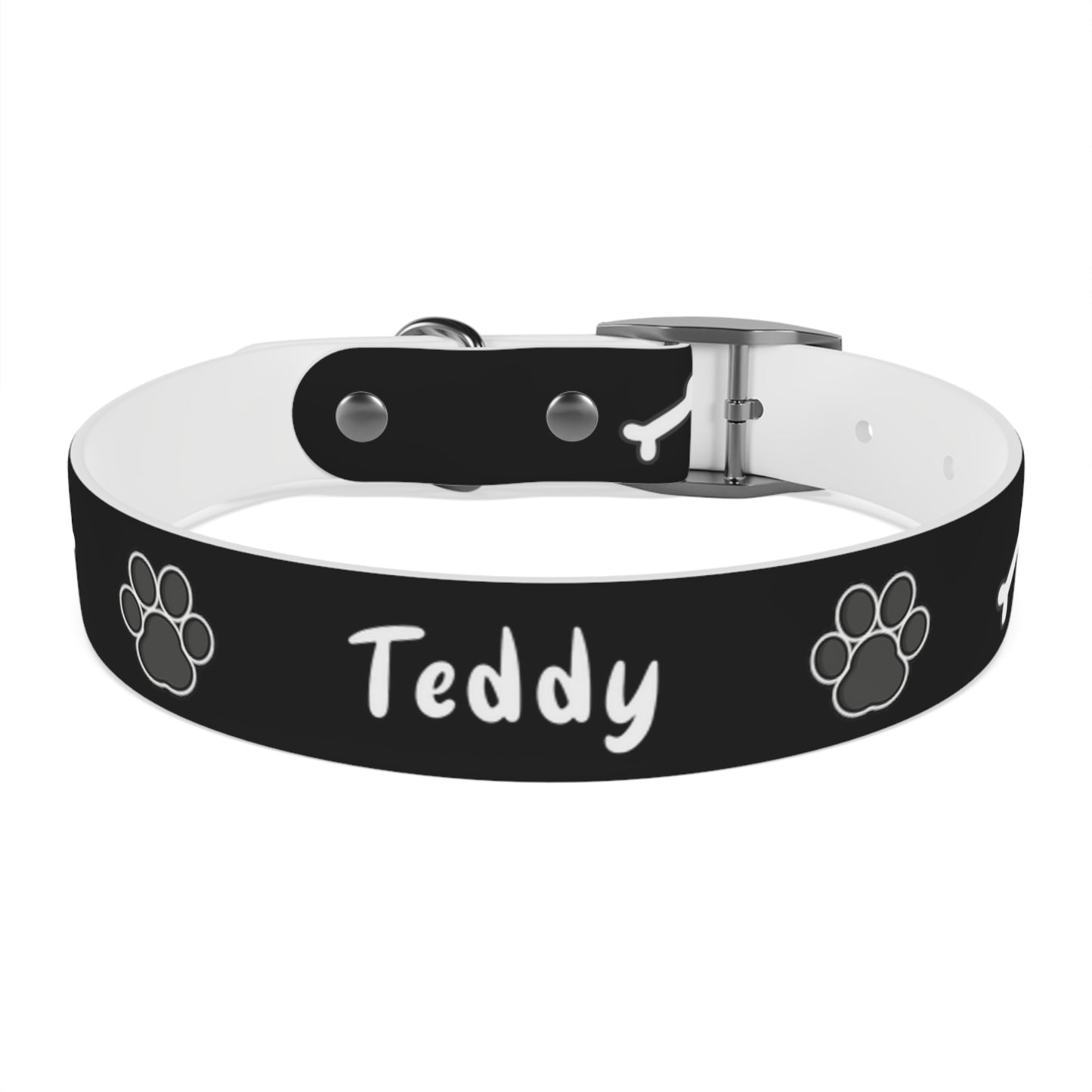 a dog collar with dog bones and paws design. The name of the dog is in the middle of the pet collar.  The dog collar color is black