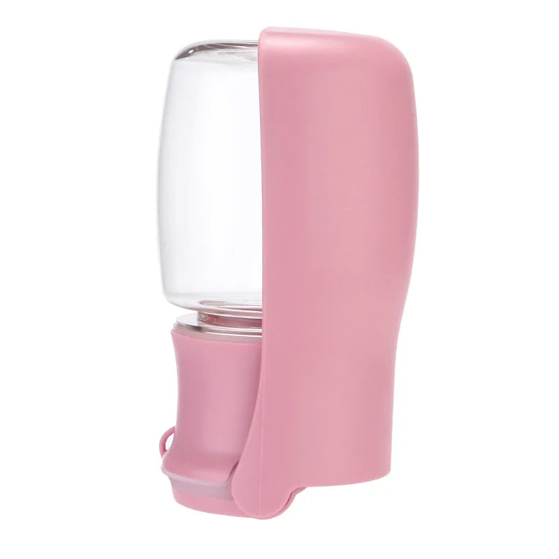 A portable pet water bottle. The pet water bottle color is pink
