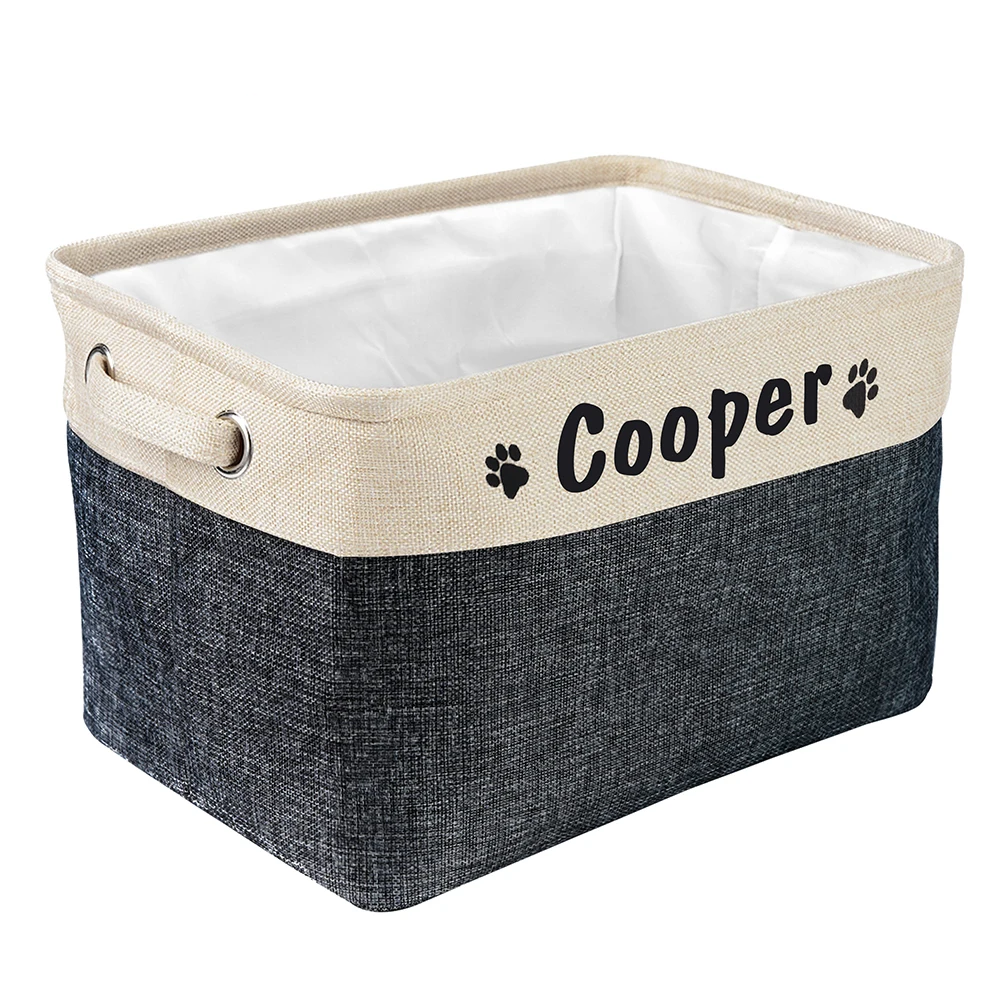a personalized pet toy basket filled with dog toys. Color of the pet toy basket is black