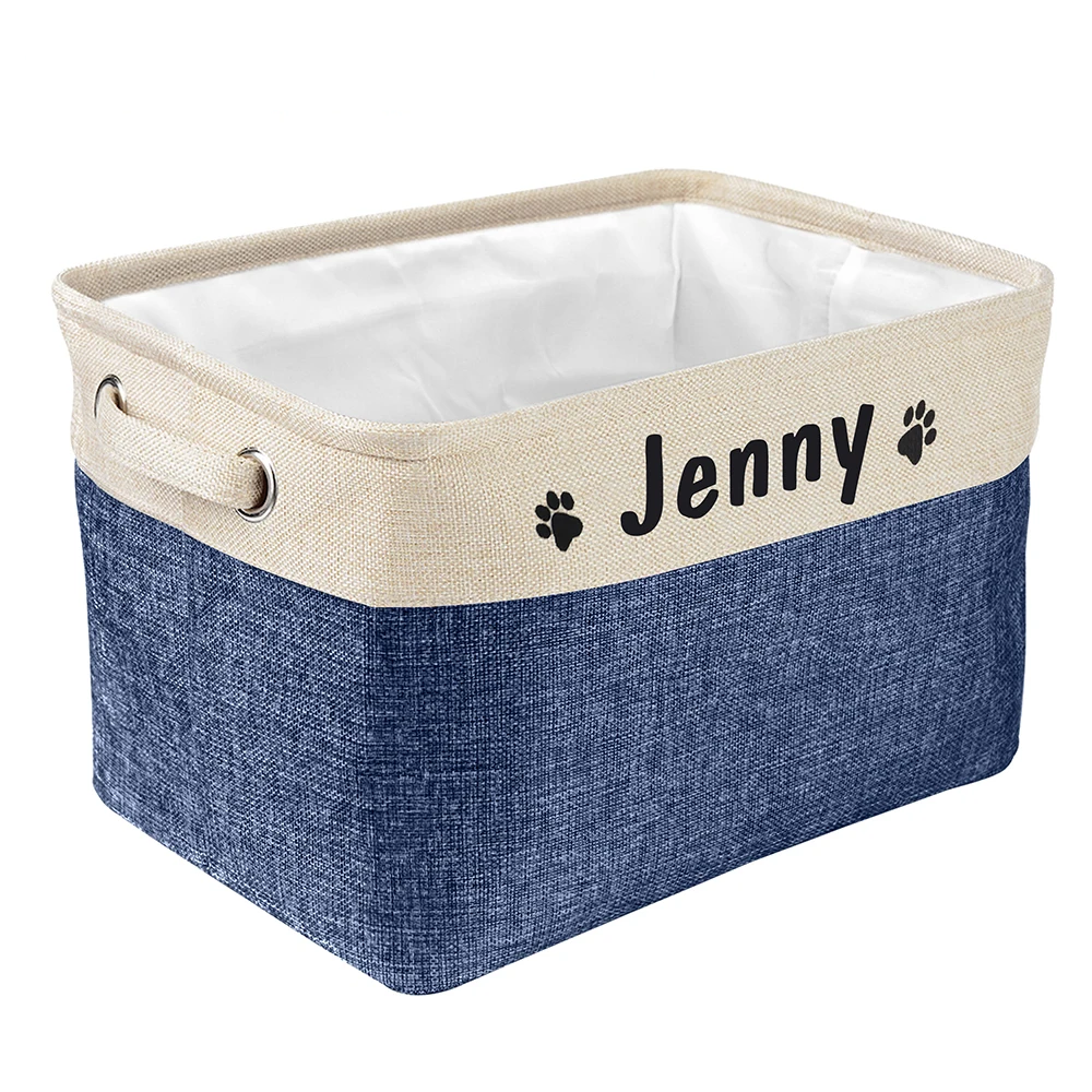 a personalized pet toy basket filled with dog toys. Color of the pet toy basket is dark blue