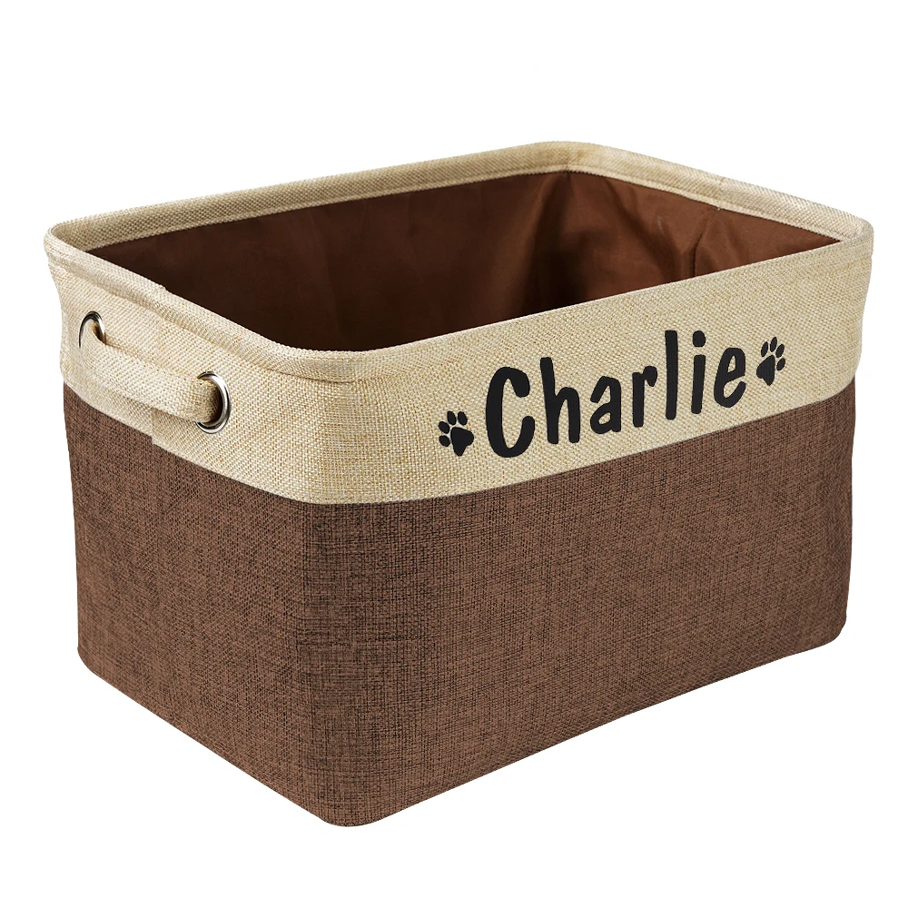 a personalized pet toy basket filled with dog toys. Color of the pet toy basket is brown
