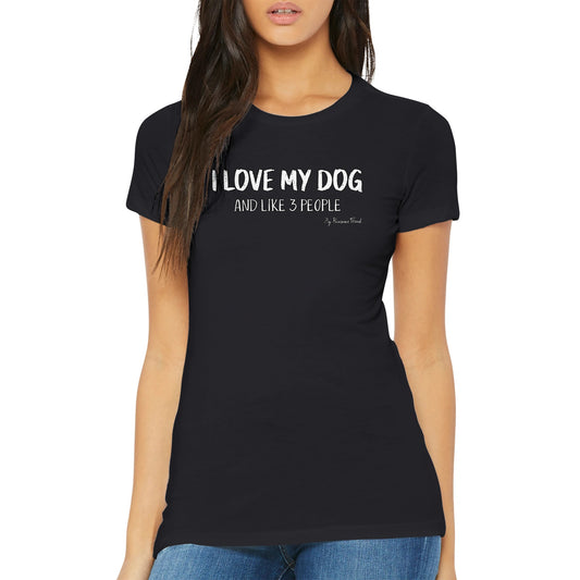 A woman wearing a Premium Women's Crewneck T-Shirt with the message: "I Love My Dog (and like 3 people)". The color of the premium women's t shirt is black