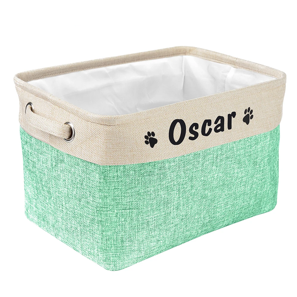 a personalized pet toy basket filled with dog toys. Color of the pet toy basket is green