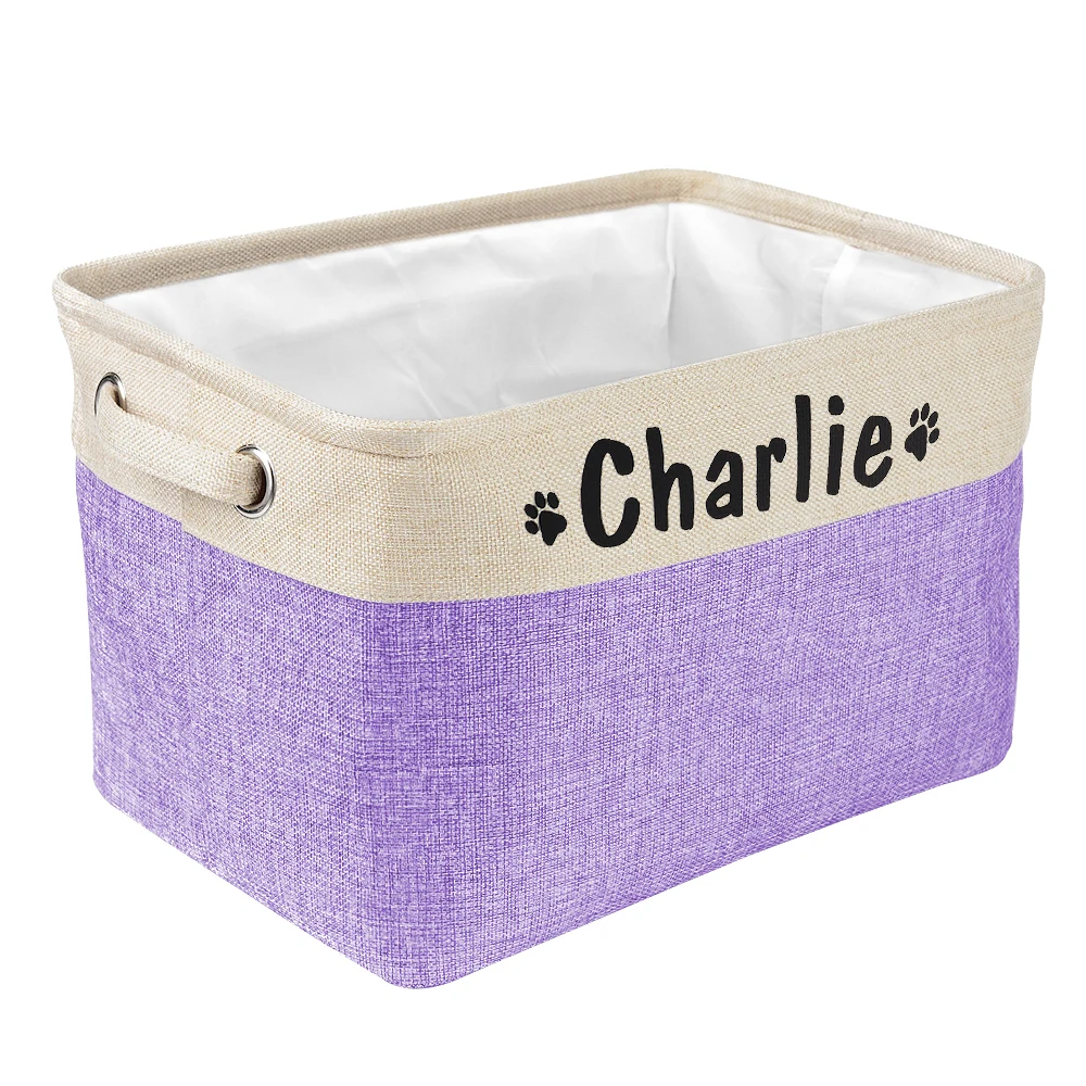 a personalized pet toy basket filled with dog toys. Color of the pet toy basket is purple