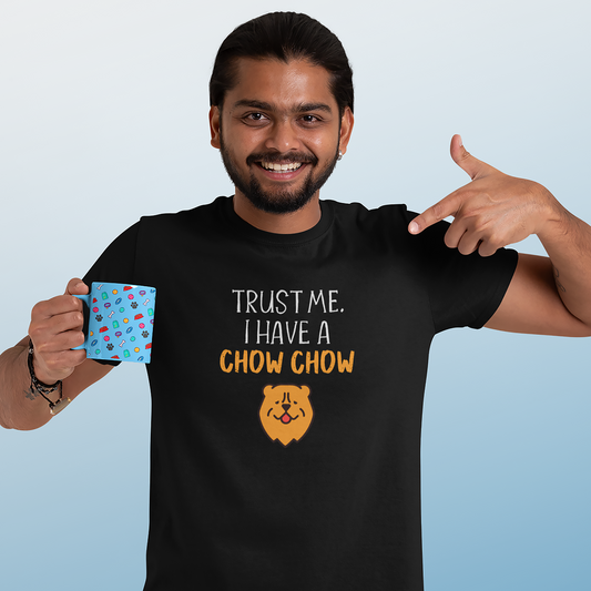 A man wearing an Unisex t shirt with the slogan: "Trust Me. I have a Chow Chow". Color is black